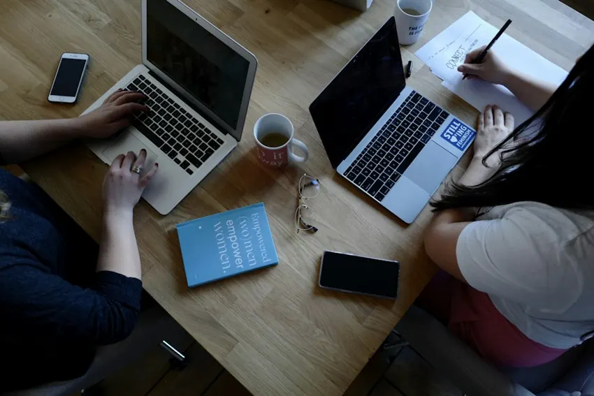 Colleagues discussing a business workflow